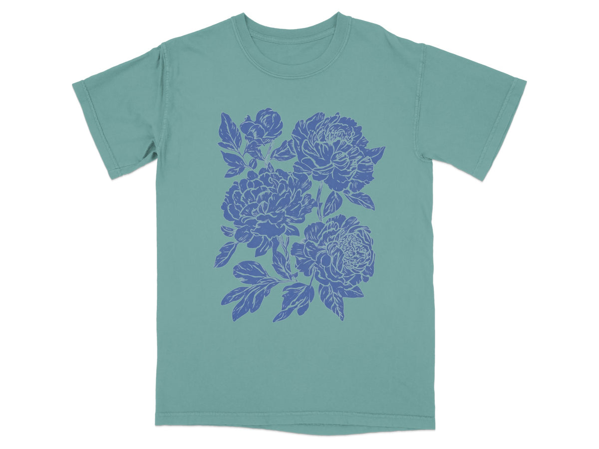 Blue Floral Design on Green Graphic T-shirt