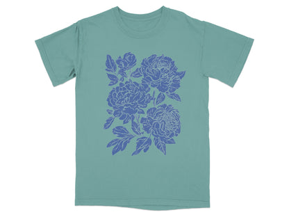 Blue Floral Design on Green Graphic T-shirt