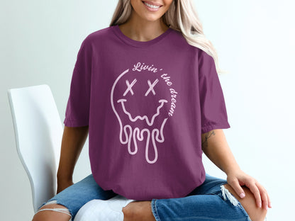 Livin' the dream dripping smiley face graphic shirt