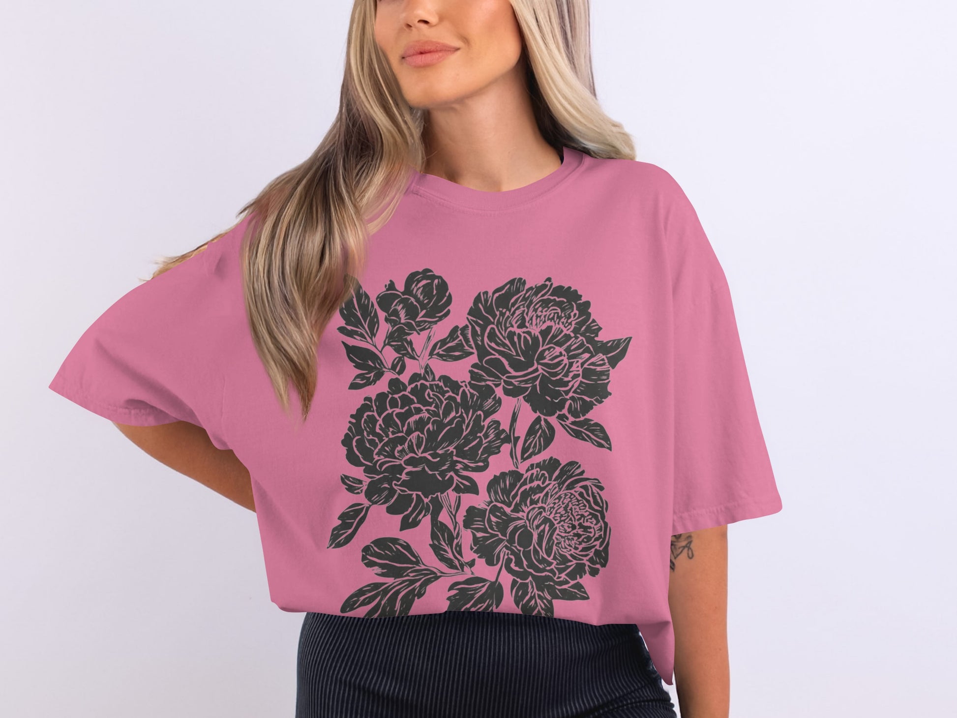Stylish Pink T-Shirt with Black Floral Design