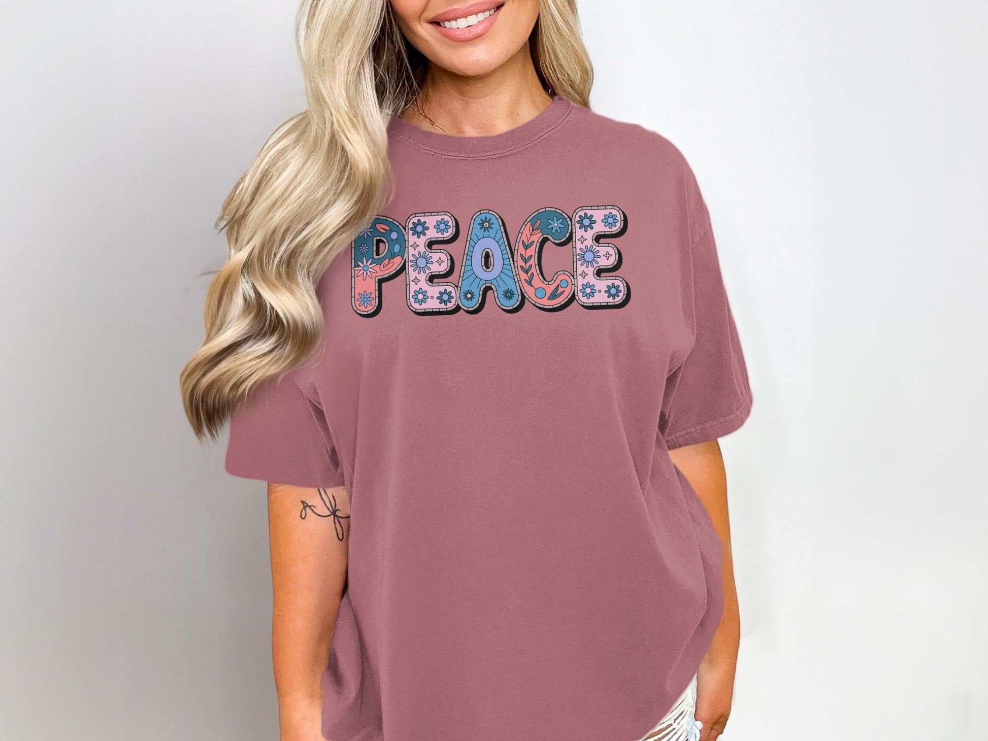 Peace Graphic Teal and Pink Letters T-shirt Product