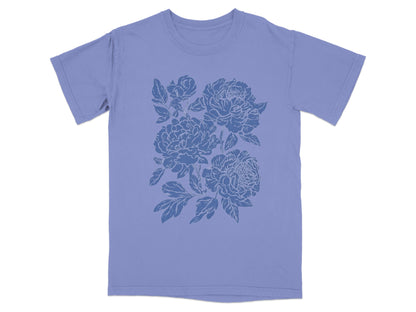 Floral Graphic Design T-Shirt with Blue Background